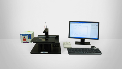 FilmTek 3000 combined reflection-transmission spectrophotometer for measuring very thin absorbing films on transparent substrates