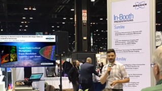  Rob Hobson, Ph.D. discusses the benefits of SML microscopy and its applications on the convention hall floor at NEUROSCIENCE 2019.