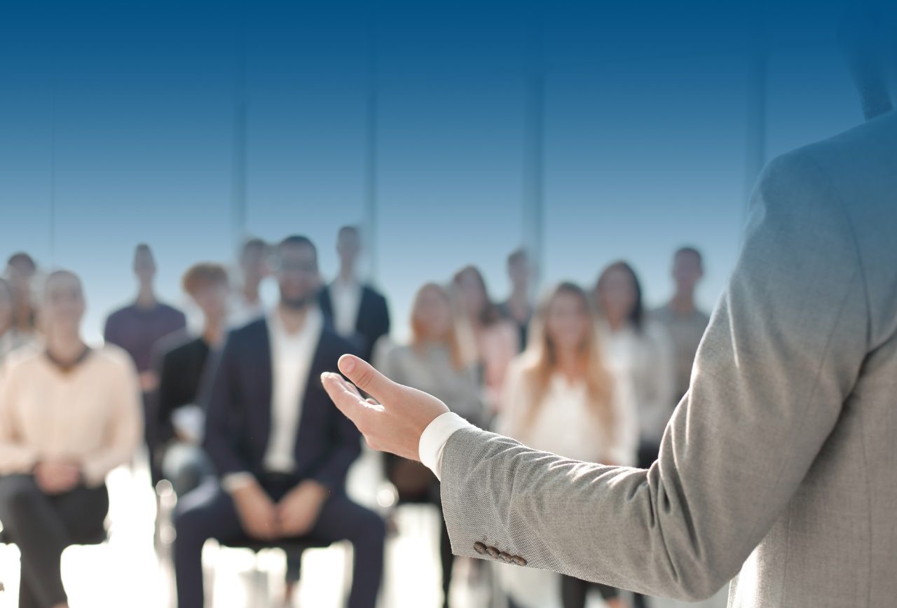 AdobeStock-353728078-giving-presentation