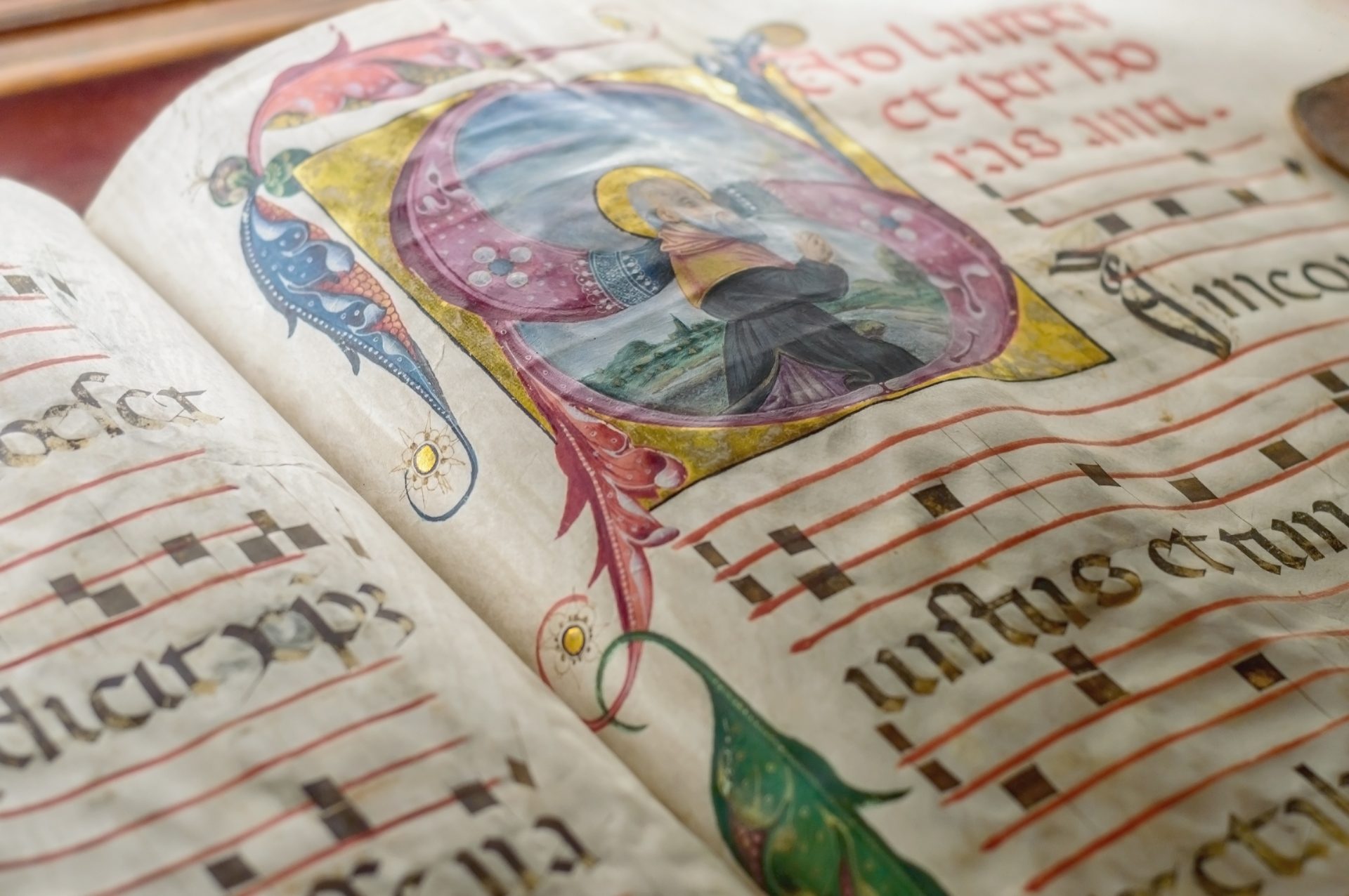 Medieval ancient illuminated manuscript with gregorian chant music