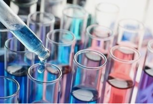 Centralize Chemistry pipette and colorful test tubes