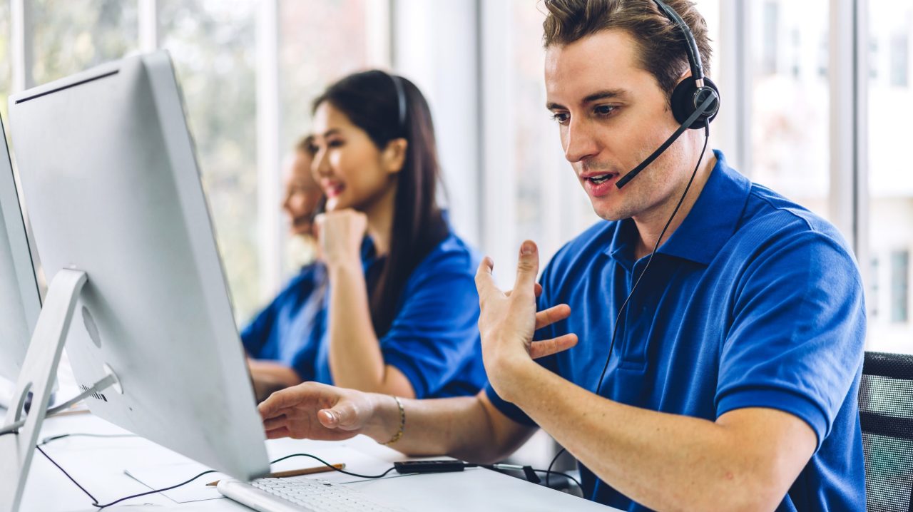 People with headsets in a Bruker call center ready to take the customer request for an individual online demo