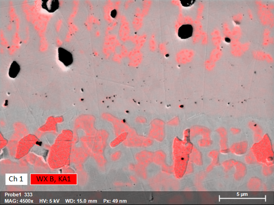 Boron X-ray intensity map of steel-dispersion layer interface. Different distinct boron phases can be seen in both layers