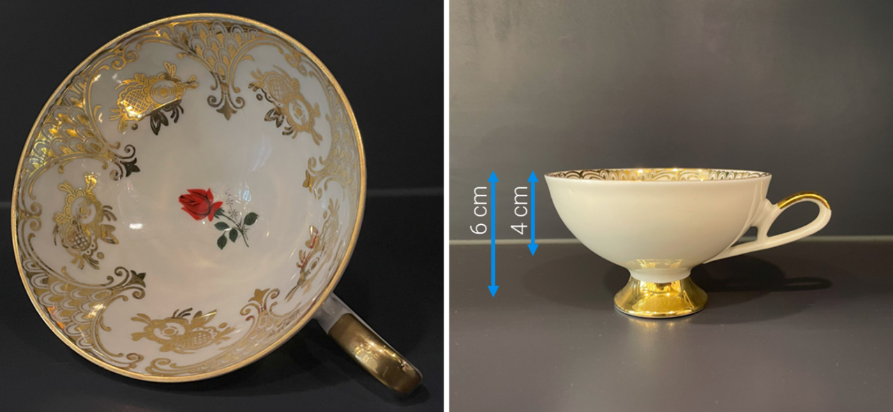 Optical image of a highly-decorated teacup with gold leaf around the rim and a painted inner surface at its deepest point