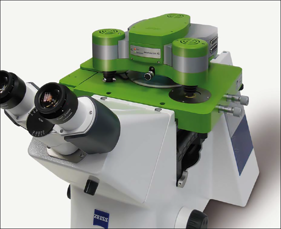 Image shows the ForceRobot® 300 mounted on an inverted microscope with the MappingStage for automated force spectroscopy mapping.