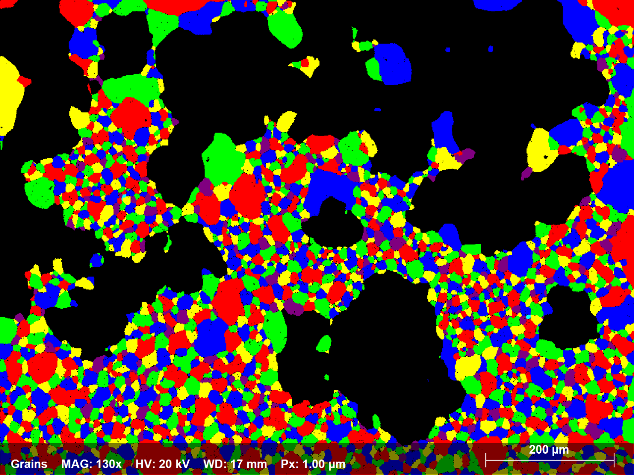 1.4: Subconjunto del mapa EBSD de aleación de Ni que muestra en colores aleatorios todos los granos con un diámetro equivalente inferior a 70 micras; hay 2250 granos que representan el 58% del área del mapa