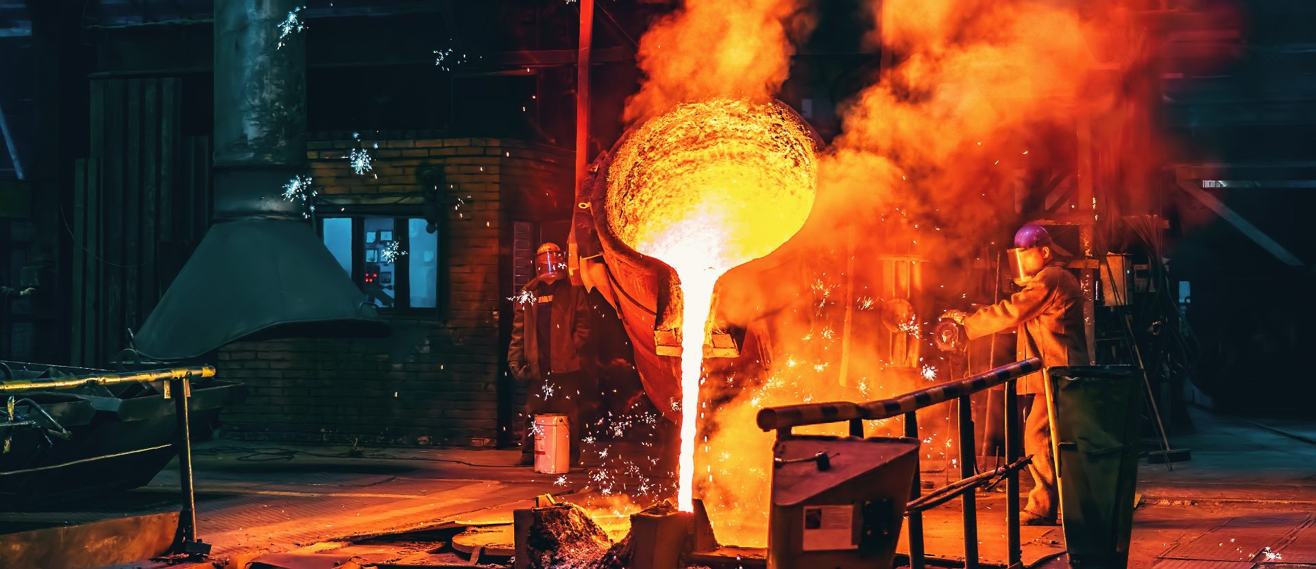 Liquid metal being poured at steel factory