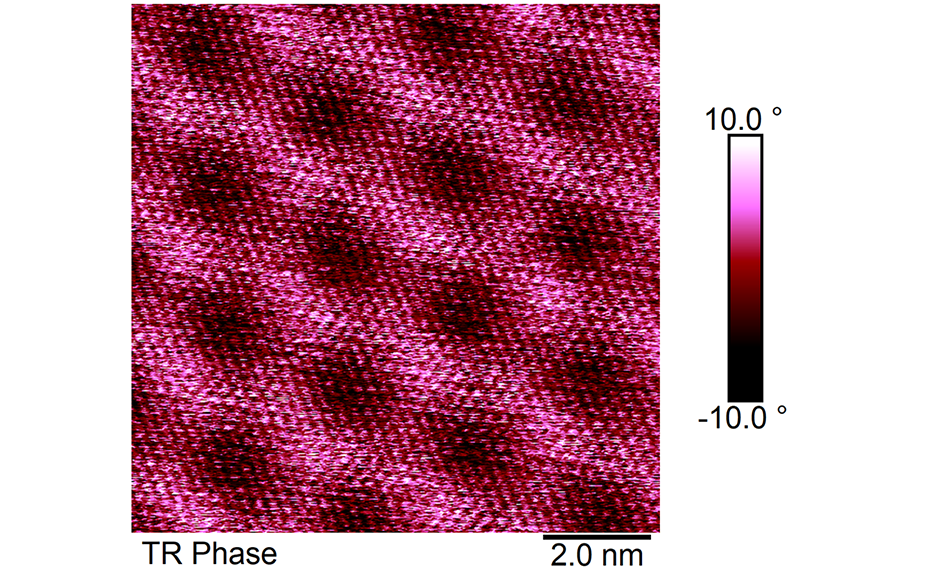 Torsional resonance force microscopy phase channel image of a moiré superlattice formed between monolayer graphene and hBN. The lattice has a period of 2.6 nm and is adapted from a research paper by M. Pendharkar, S.J. Tran, G. Zaborski, et al. (2024). The image is licensed under CC BY.