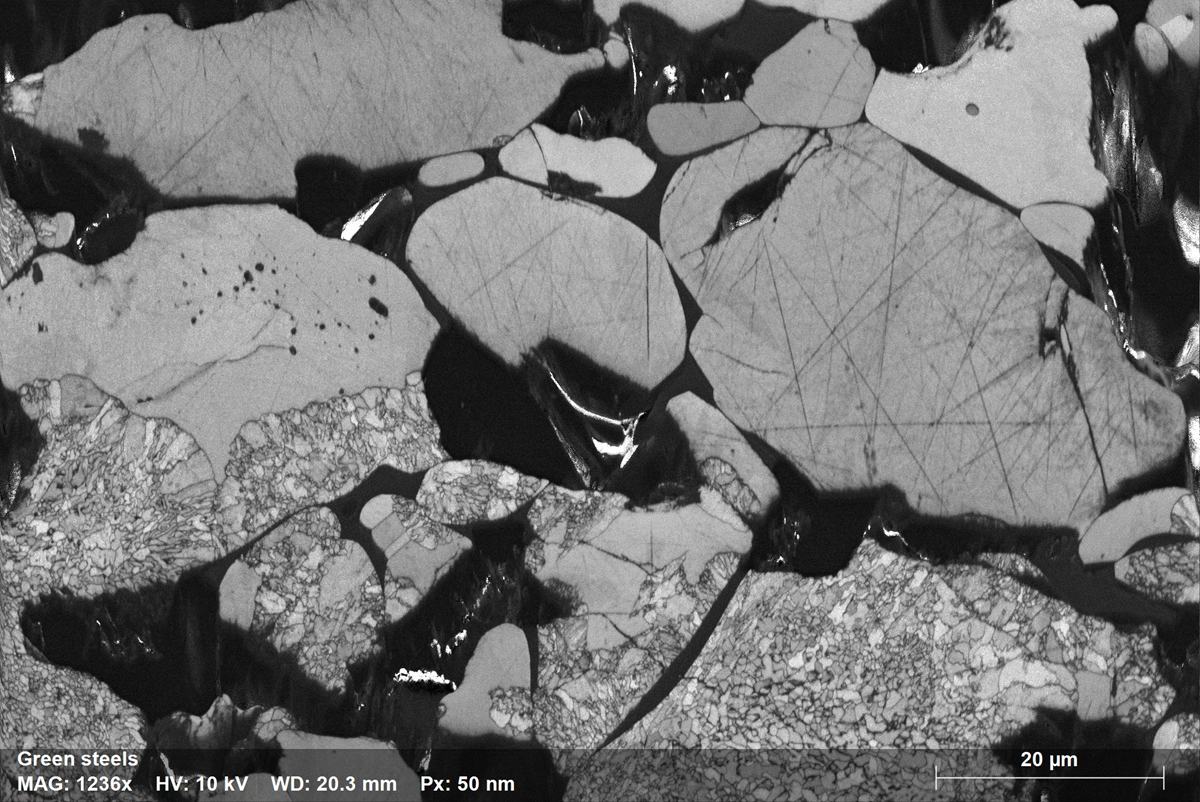 EBSD pattern quality map of a hemitite before reduction. Many fine grains can be seen as well as large single crystals with few inclusions.